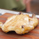 cooked chicken on cutting board