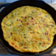 omelet in a cast iron pan
